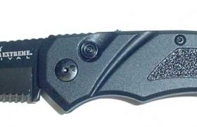 SCHRADE 70 DROP POINT AUTOMATIC BLACK PART SERRATED BLADE